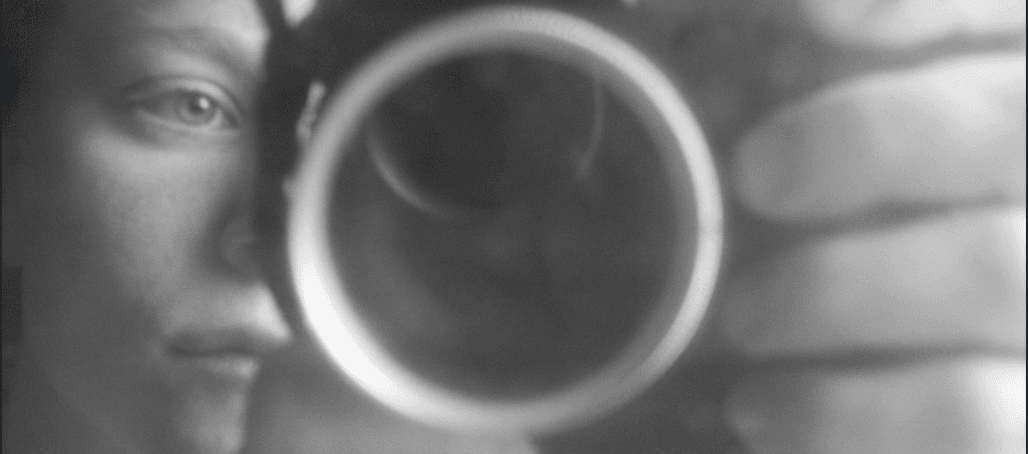 Black and white camera lens portrait